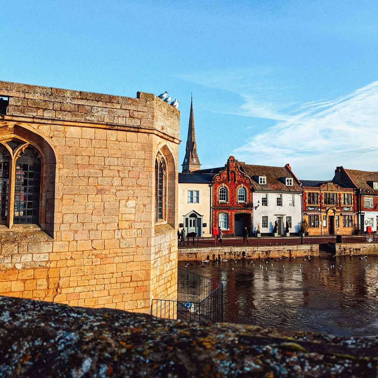 St Ives, Cambridgeshire photography taken from off the bridge, featuring the church